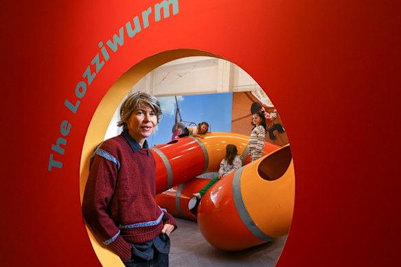Curator Gabriela Burkhalter with the Lozziwurm at Incinerator Gallery.