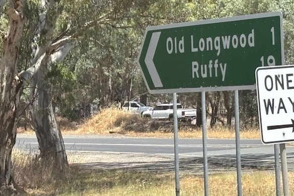Arson investigators outside Longwood, near where the fire started.