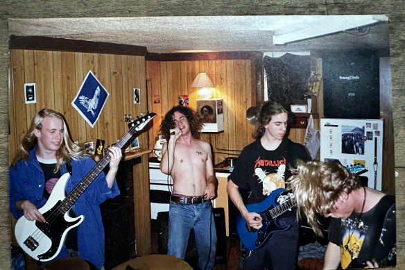 Jeremy Buckingham (centre) grew up off the grid in Tasmania, wearing hemp, smoking pot and playing in a heavy metal rock band.