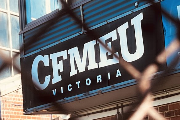 A CFMEU official has been charged with deception crimes. 
