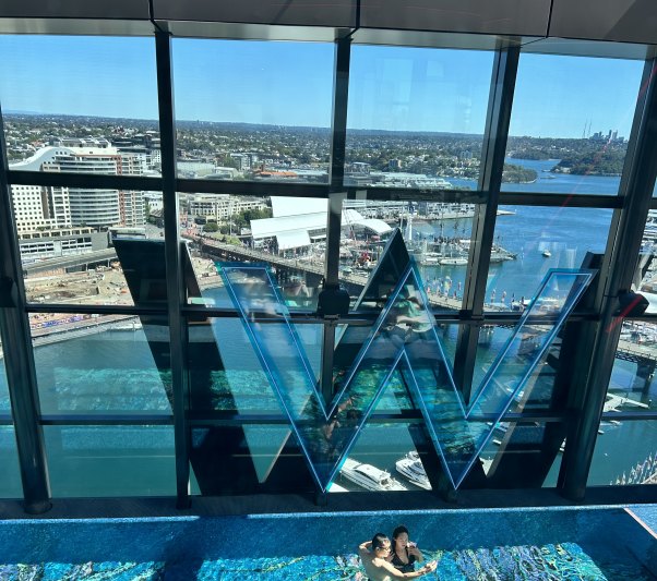 Guests pose for a selfie in the infinity pool on 29.