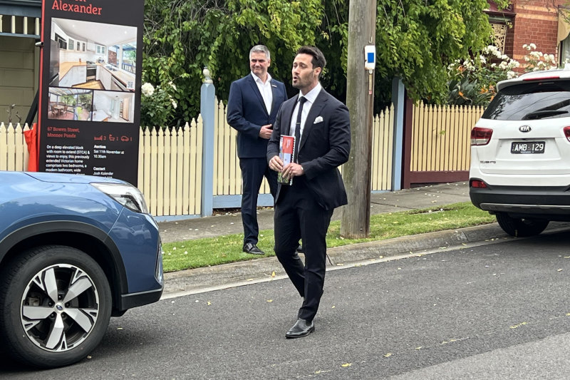 Nelson Alexander Kensington auctioneer Josh Kalender calls for bids during the Moonee Ponds auction.