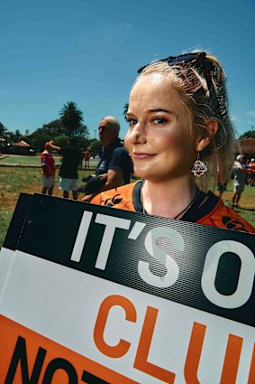 Hannah Nichols and her Wests Tigers earrings.