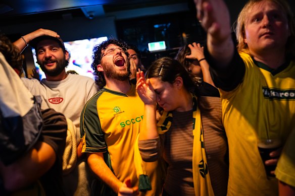 Fans at the Golden Barley react during the Socceroos’ match against the United States on Saturday morning.