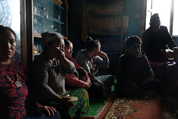 Residents of Thulo Bharkhu, a hamlet that lost 22 people in the floods, pray for their deceased loved ones even as the search continues to recover their bodies.