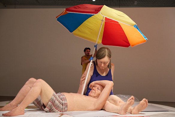 Installation of Mueck’s Couple Under an Umbrella (2013-2015) on loan from Giverny Capital Collection Montreal. 