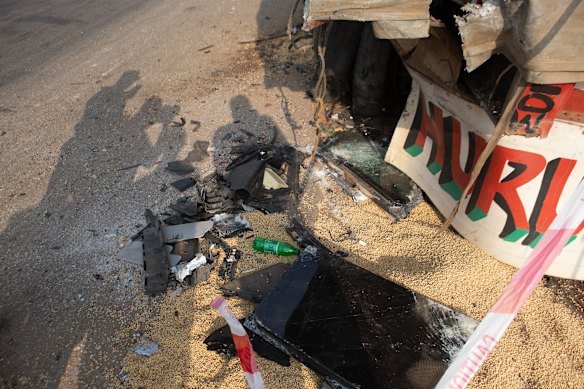 Shattered glass and other debris at the scene of the accident site in Nigeria.