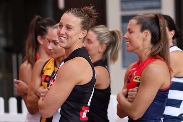 Ruby Schleicher, centre left, of the Magpies on AFLW captain’s day.