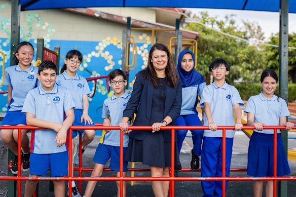 Beverley Hills Primary School acting principal Elena Pitsiakkos with year 5 students Alina, Azlan, Clara, Quinton, Rahma, Morgan and Olivia. 