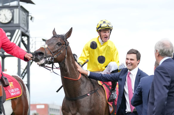 Trainer Sam Freedman (right), jockey Mark Zahra and Without A Fight after winning the 2023 Caulfield Cup.