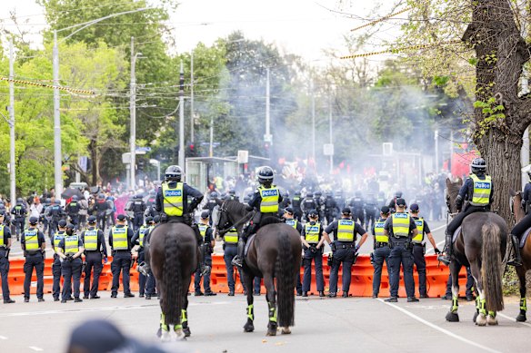 Police at the protest on Sunday.