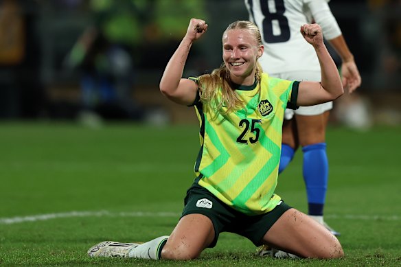 Holly McNamara celebrates her goal for Australia on Thursday night.