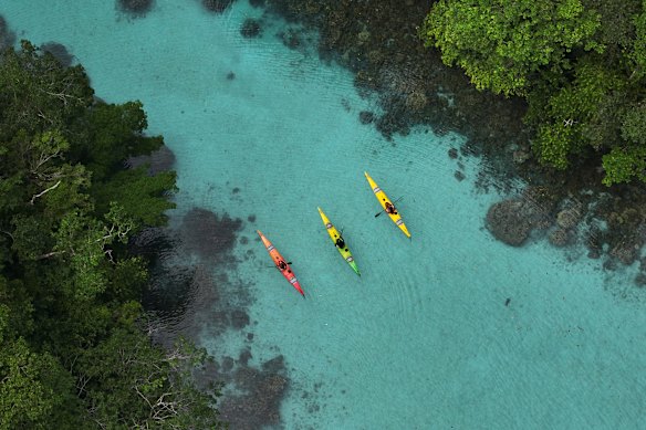 Kayaking the turquoise waters of Palau.