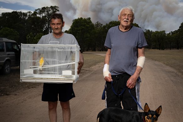 Jim Kades (left) and Warren Carr fled Longwood East on the advice of fire authorities.
