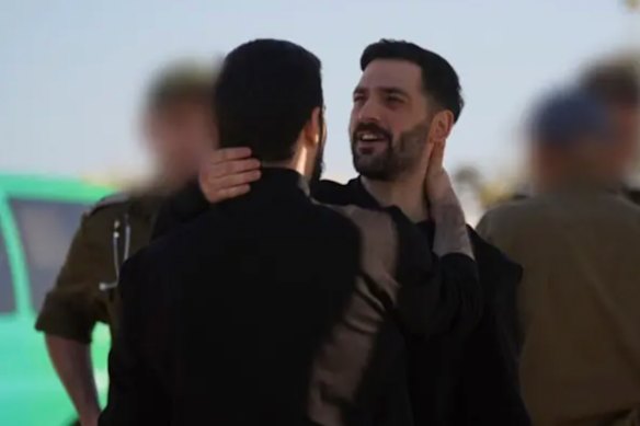 The Israeli Defence Force released this image of Gali and Ziv Berman embracing on the Gaza Strip after being released by Hamas on Monday.