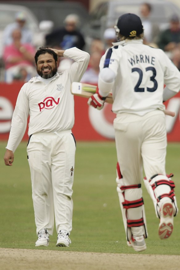 Mustaq locking horns with his friendly rival Shane Warne in English county cricket in 2006.