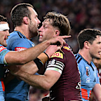 Nathan Cleary (left) and Cameron Munster in a scrap on Wednesday night.