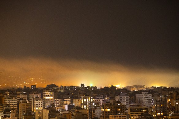 Flames rise following an Israeli airstrike in Dahiyeh, in Beirut&rsquo;s southern suburbs, on Thursday.