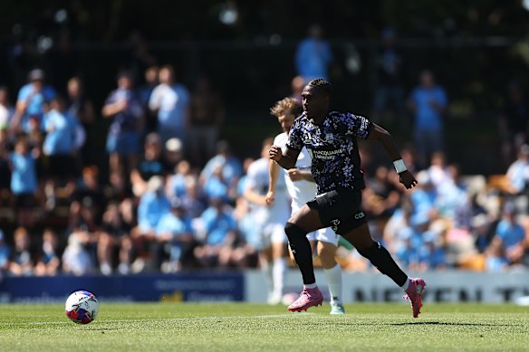 Al Hassan Toure on duty for Sydney FC.