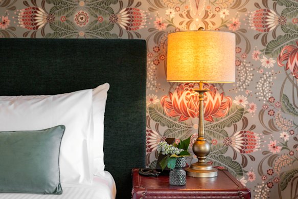 No two rooms are alike and many feature custom wallpaper.