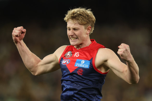 Melbourne’s Jacob van Rooyen celebrates after scoring against Richmond in round 7.