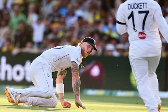  Ben Stokes takes the catch to dismiss Starc, despite a near collission with Ben Duckett.