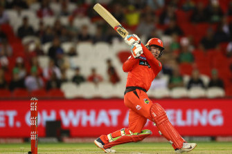 Mackenzie Harvey hits out for the Renegades in their win over the Melbourne Stars at Marvel Stadium.