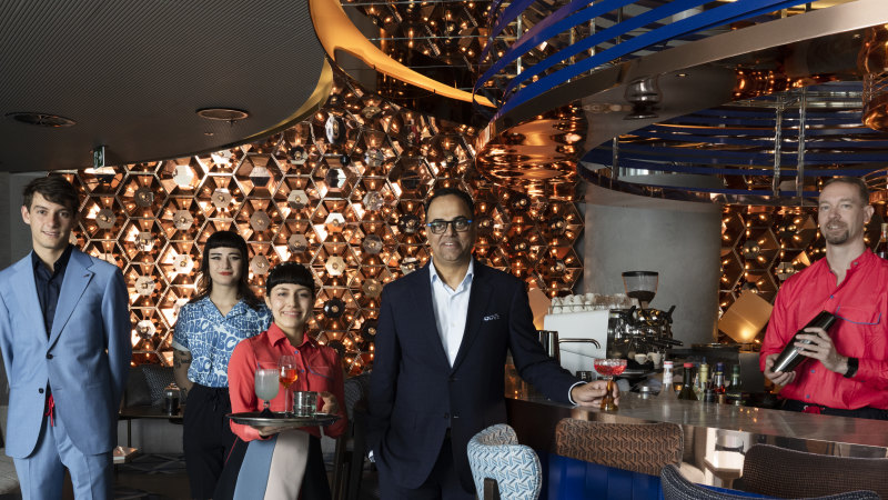 Marriott boss Rajeev Menon with staff in W Sydney’s Living Room bar.