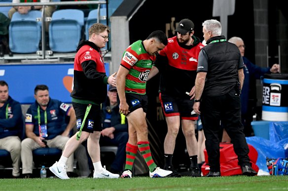 Cody Walker hobbles off with a calf injury.