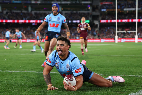 Latrell Mitchell bags a try for the Blues. 