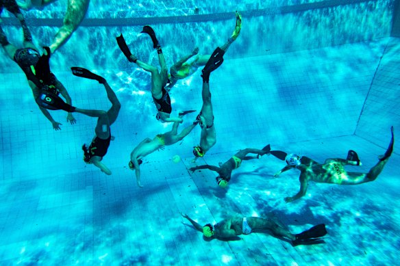 The UNSW underwater rugby team trains at Leichhardt Park Aquatic Centre in Sydney.