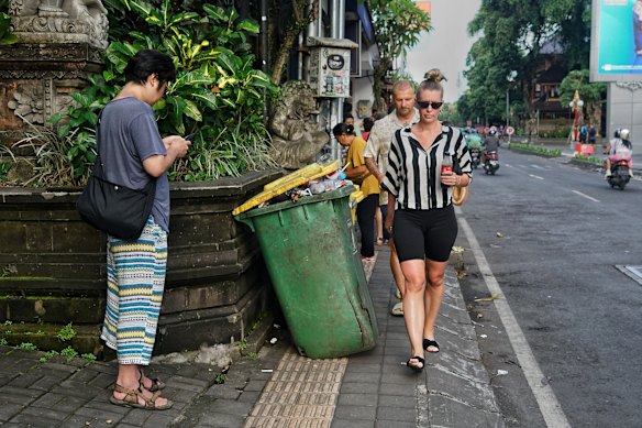 Tourists navigating the footpaths in Ubud. 