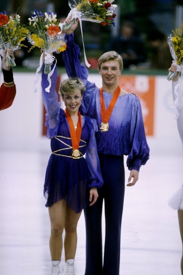 Jayne Torvill and Christopher Dean celebrate their gold medals in 1984.