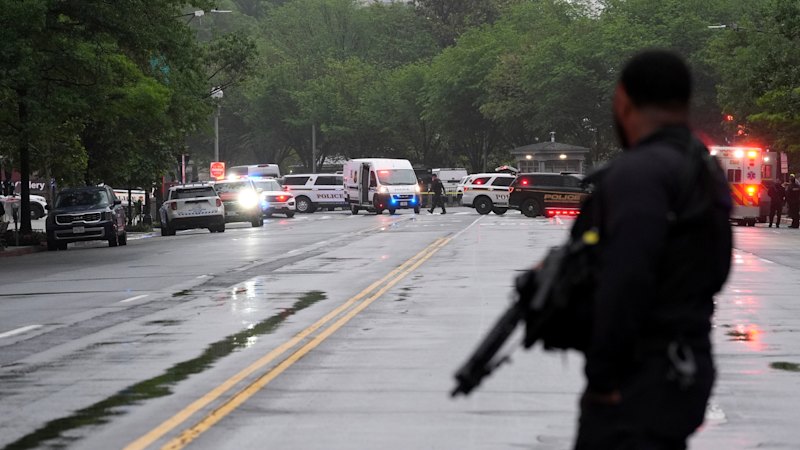 Reporters and staff take cover as gunshots ring out near presidential residence