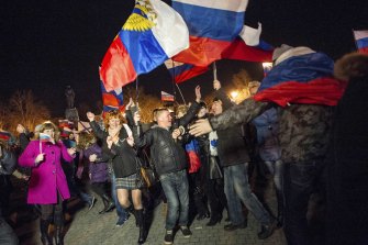 In Crimea, where about half the population is ethnically Russian, pro-Putin crowds celebrated the annexation in 2014.