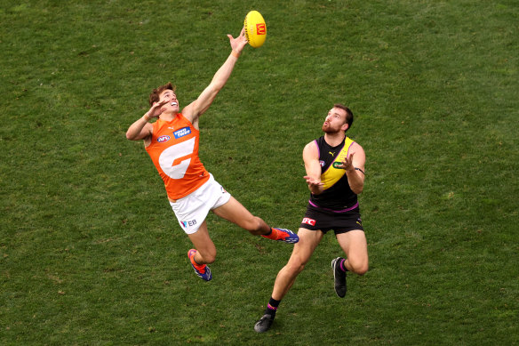 Aaron Cadman flies for the ball against Richmond during season 2024.