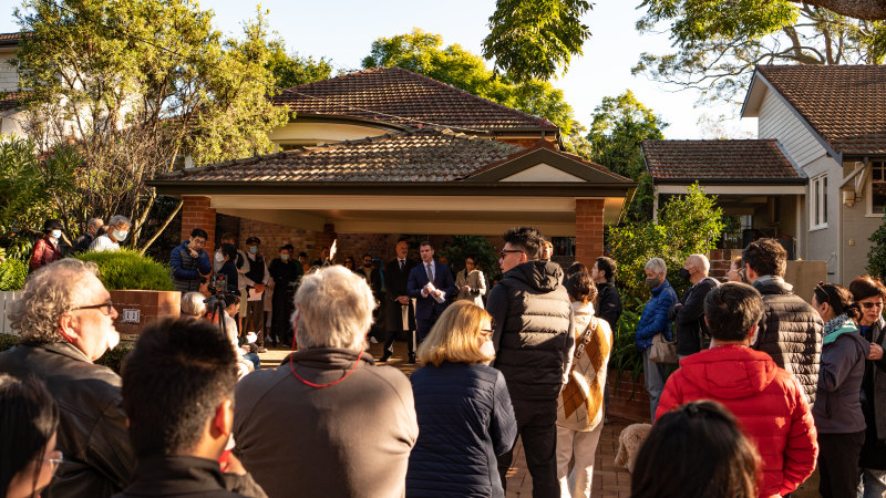 Thirteen buyers registered to bid on the three-bedroom house.