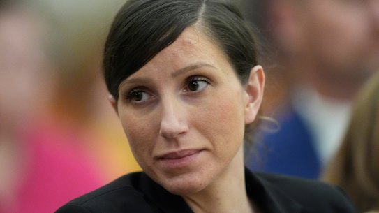 Kouri Richins, a Utah mother of three who wrote a children’s book about coping with grief after her husband’s death and was later accused of fatally poisoning him, looks on during a hearing.