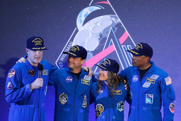 The Artemis II crew speak after their successful mission to orbit the moon.