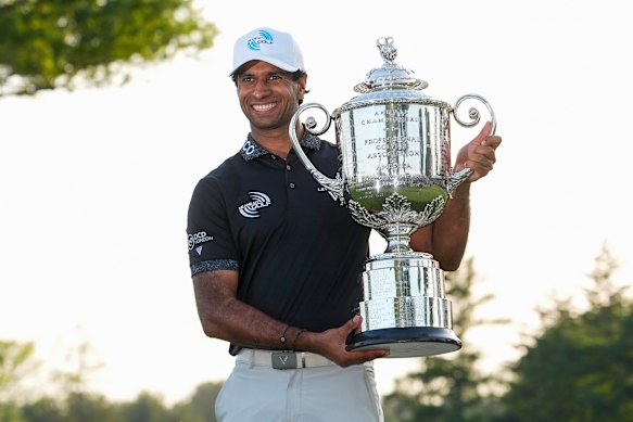 Rai with the spoils of his win.