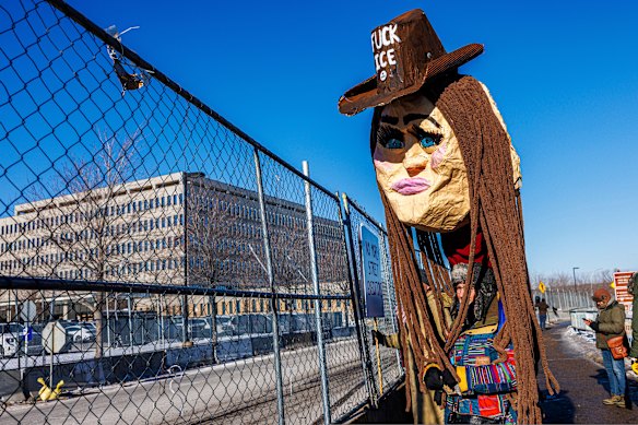 Protesters outside the Whipple federal building in Minneapolis, where ICE is headquartered in the city.