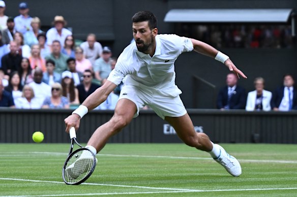 Novak Djokovic of Serbia plays a backhand against Miomir Kecmanovic.