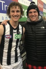 Chris Mayne and Michael Donehue after Collingwood beat Geelong in the 2019 finals.