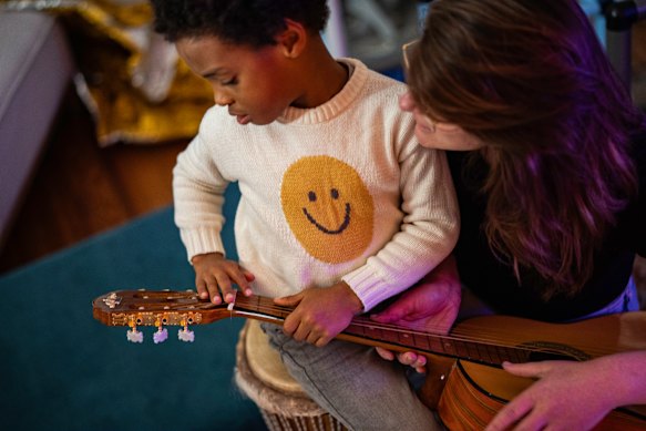 Ellis Easton, 6, and his speech-language therapist, Corinne Zmoos, in Baltimore.