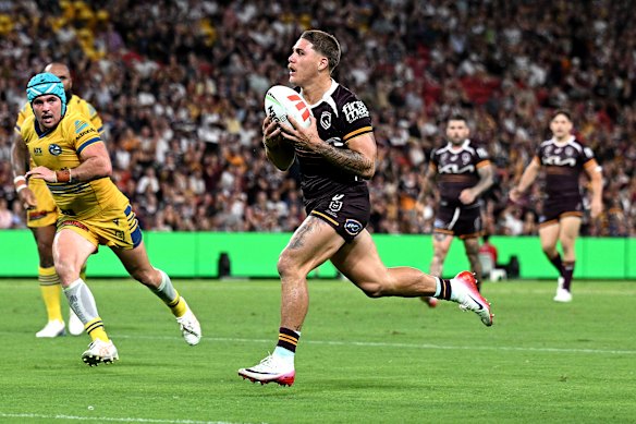 Reece Walsh scores a try against the Eels.
