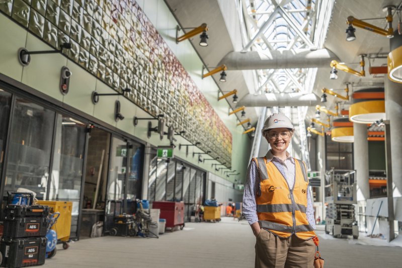 Space for rent: Aoife Kealy, Cross Yarra Partnership’s director for commercial development and services at Melbourne’s Parkville Metro station, where a Patricia Piccinini artwork covers one wall.