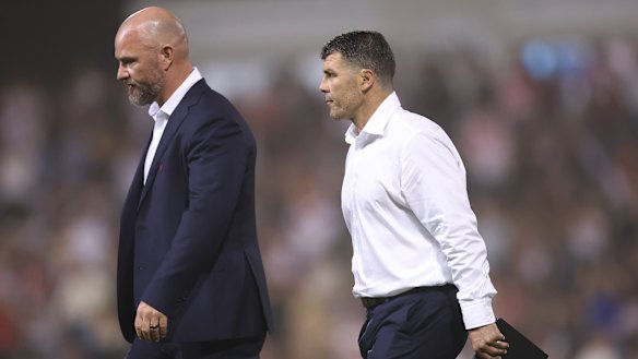 Dean Young and Michael Ennis after a Dragons match early this month. Young informed Ennis he was no longer needed as an assistant coach.