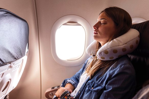 Neck pillows on a long flight can offer better spinal alignment and head support.