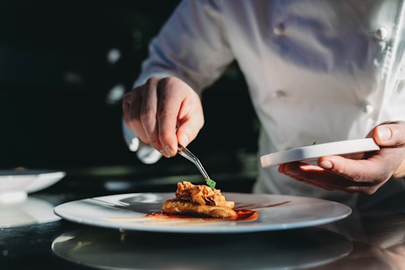 Michelin-starred restaurants are a theatrical experience with the maitre d’ and waiters players in a strange production.