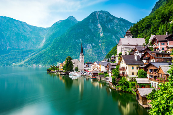 Austria’s lakeside village of Hallstatt is popular with tourists so choose the time and manner of your own visit carefully.